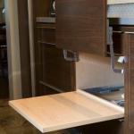 This cabinet and pullout were designed to house the family's microwave.