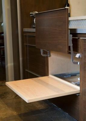 This cabinet and pullout were designed to house the family's microwave.